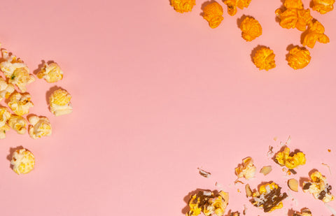 Sweet and savory Marigold Gourmet Popcorn on a yellow background