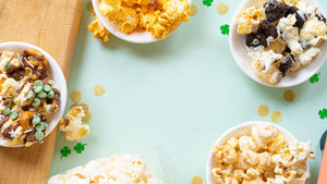 St. Patrick's day themed gourmet popcorn flavors displayed on a light green background